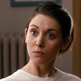 Celebrity gif. Alison Brie blinks and shakes her head before narrowing her eyes and opening her mouth in an expression of shock and confusion.