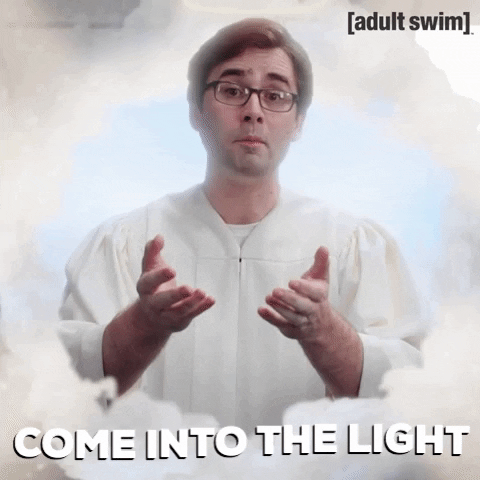 TV gif. A scene from Your Pretty Face is Going to Hell. Surrounded by clouds and white light, an angelic man in a white robe and glasses tells us to: Text, "Come into the light."