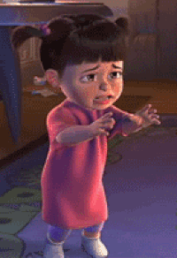 Cartoon gif. A slight zoom in on Boo from Monsters, Inc. as she reaches out and looks like she's about to cry.