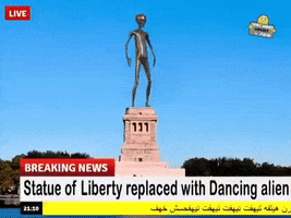 Digital art gif. A chrome alien has taken the place of the Statue of Liberty and is dance using tutting moves on the platform where she used to be. The text reads, "Breaking News: The Statue of Liberty Replaced with Dancing Alien."