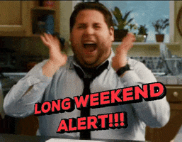 Celebrity gif. Jonah Hill screams in excitement, shaking his hands hysterically above the message, “Long weekend alert!!!”