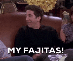 Friends gif. David Schwimmer as Ross appears panicked as he sits up from a couch and says, "My fajitas!" which appears as text.