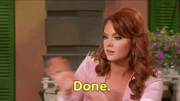 Reality TV gif. Wearing a pastel pink shirt with gold accents, Kathryn Dennis from Vanderpump Rules crosses her hands and waves them apart in disapproval as she says: Text, "Done."