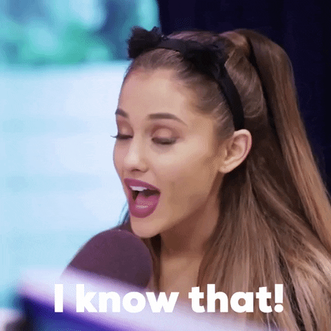 Celebrity gif. Ariana Grande leans into her microphone as she says earnestly with a small smile, "I know that!"