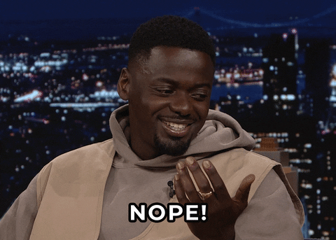 Tonight Show gif. Daniel Kaluuya smiles widely before deadpanning his expression to announce, "Nope!"