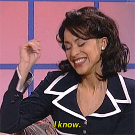 TV gif. Karyn Parsons as Hilary Banks on The Fresh Prince of Bel Air has a cheeky smile on her face as she says, “I know.” She giggles, flattered by what someone has just said to her. 