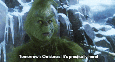 Movie gif. Jim Carrey as the Grinch from How the Grinch Stole Christmas stares off into the distance from his icy, windy mountaintop. He speaks out of the side of his mouth: Text, "Tomorrow's Christmas! It's practically here!"