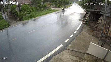 Speeding Truck Tips Over On Slippery Road GIF by ViralHog