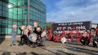 Squid Game-Themed Demonstration Unfolds Outside COP26 Summit Venue in Glasgow