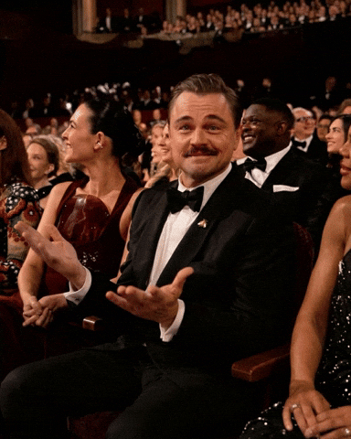 Leonardo Dicaprio Shrug GIF