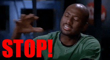 Movie gif. Frustrated Romany Malco as Jay in The 40-Year-Old Virgin throws his hand in the air and says, “Stop!”