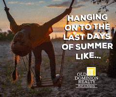 Photo gif. Young girl bends backwards while standing on a wooden swing that overlooks a sunkissed field of lilacs. Text reads, "Hanging on to the last days of summer like..." and an Old Dominion Reality logo fills the corner.