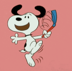 Pohyblivá animace s radujícím se černobílým psem s řehtačkou na růžovém pozadí. 