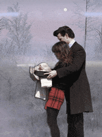 because he hugs her from behind my heart GIF