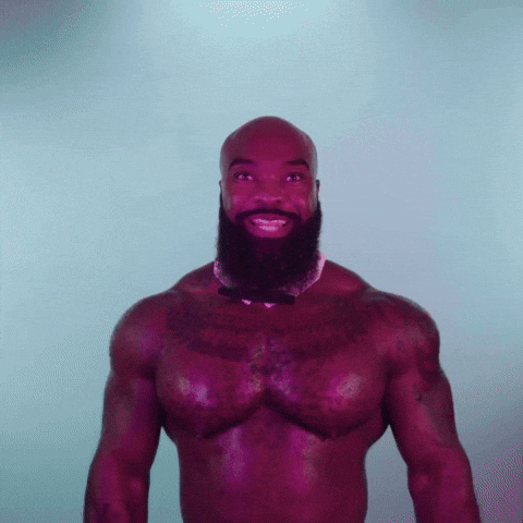 Video gif. A bald man with a bushy beard smiles at us excitedly and says, “let’s go!”
