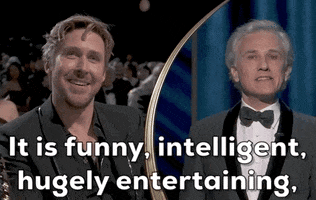 Oscars 2024 GIF. Split screen of Ryan Gosling attentive and laughing nervously as Christoph Waltz says, “It is funny, intelligent, hugely entertaining, and ultimately poignant.”