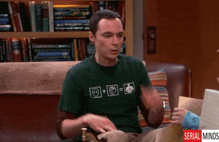 TV gif. Jim Parsons as Sheldon on the Big Bang Theory sits in his spot on the couch. He pinches his nose and sticks his tongue out in disapproval, giving a big thumbs down.