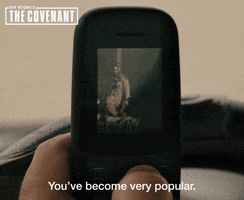 thecovenantmovie popular military jake gyllenhaal cell phone GIF