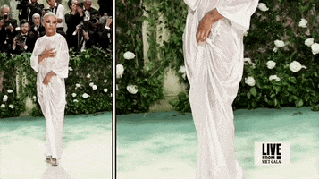 Met Gala 2024 gif. Side-by-side photos of Doja Cat wearing a literally drenched ventements floor-length white t-shirt dress with sparkly black mascara is dripping down her cheeks. 