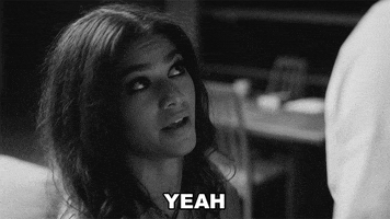 Movie gif. Zendaya as Marie in Malcolm and Marie looks up at Malcolm, shaking her head, and sassily saying, “Yeah.”