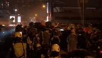 Petrol Bombs Rain Down on Police Van as it Approaches Protesters