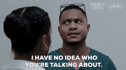 Man gesturing with open palms in a confused 'I don’t know that man' reaction GIF