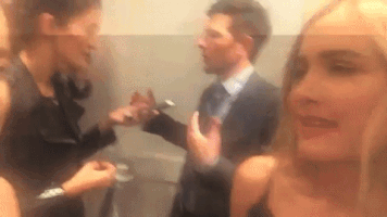 strippingdowncelebs whatevs shoulder shrug maude apatow GIF