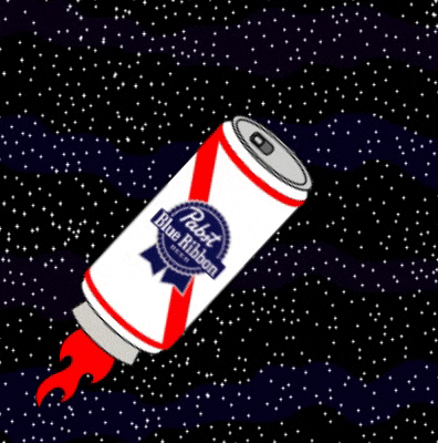 Ad gif. A bottle of Pabst Blue Ribbon is soaring through the galaxy with flames coming out behind it.
