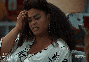 TV gif. Jill Scott as Hazel on First Wives Club scratching her head and looking uncertain.