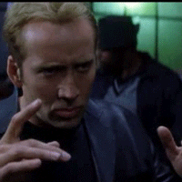 Movie gif. Nicholas Cage as Memphis Raines in Gone in 60 Seconds stares slightly down and twirls his fingers then shakes them as if to say "okay, let's go."