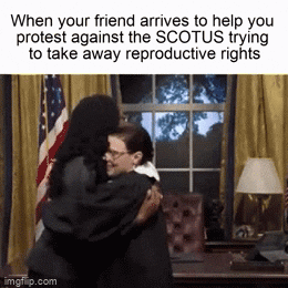 SNL gif. Kate McKinnon as Ruth Bader Ginsburg and Ego Nwodim as Kentanji Brown-Jackson hug each other happily in the White House's Oval Office. Text, "When your friend arrives to help you protest against the S-C-O-T-U-S trying to take away reproductive rights."