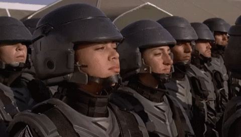 Starship Troopers. A trooper looks at the camera and says "I'm doing my part"