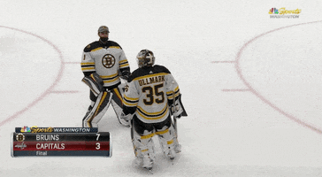 Sports gif. Bruins goalies Linus Ullmark and Jeremy Swayman crouch down and then spread their arms out like starfish before enveloping each other in a big, celebratory hug. The final score reads, "Bruins: 7, Capitals: 3."