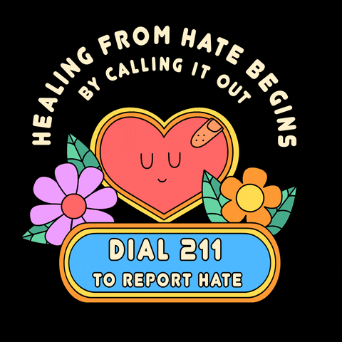 Digital art gif. Retro flower power inspired graphic of a contented, beating heart sporting a Band-aid on a black background, surrounded by bold daisies and an oblong marquee. Text, "Healing from hate begins by calling it out, Dial 211 to report hate."