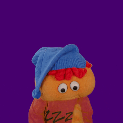 Video gif. Gerbert the humanoid puppet wears a night cap and a sweater with Zs on it, looking at us as he says, "Have a great evening... good night."