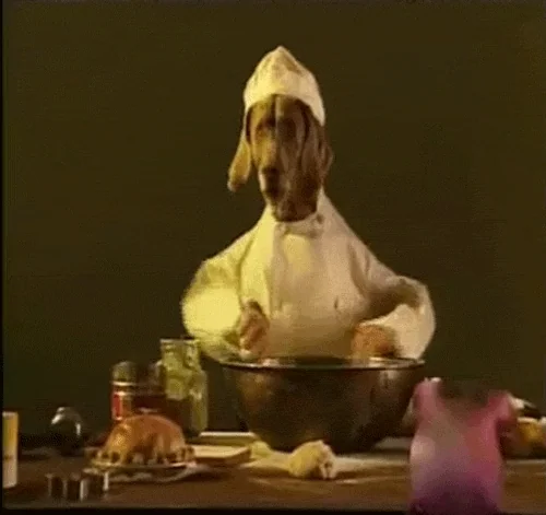 dog cooking GIF