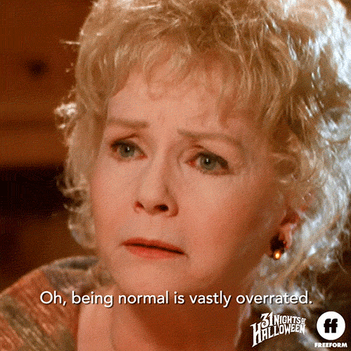 Movie gif. Debbie Reynolds as Aggie in Halloweentown rolls her eyes and cocks her head around, saying, "Oh, being normal is vastly overrated," which appears as text.
