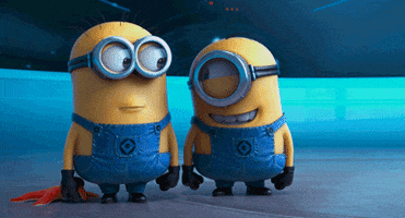 Movie gif. Two minions from Despicable Me look at each other with cheeky smiles and then burst out in uncontrollable laughter. One minion laughs so hard he has to lean on the other one.