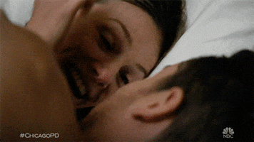 Kissing In Bed Love GIF by One Chicago