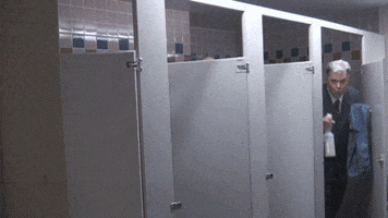 Video gif. Four men dressed in suits giddily emerge out of their bathroom stalls holding cleaning supplies. Text reads, "Work-work-work-work-work-wo-work."