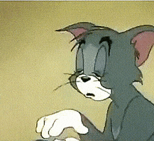 Cartoon gif. Tom of Tom and Jerry sluggishly looks down at a roll of tape. He takes two pieces and tapes his eyelids way back on his head so they are as wide as they can be.