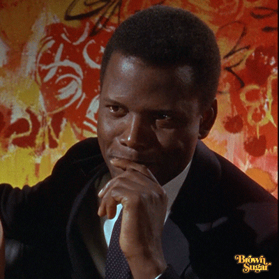 Movie gif. Sidney Poitier in Guess Who's Coming to Dinner. His finger is on his lip as he contemplates. He breaks out into a chuckle and points at the person he's speaking to, raising his eyebrows in acknowledgement of their joke.