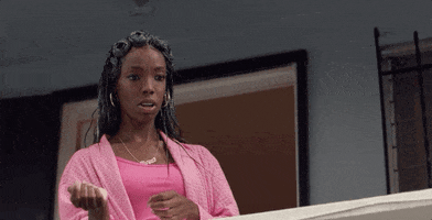 TV gif. Elle Lorraine as Trina in Insecure looks surprised, then pulls pack as she says, "Oh!"