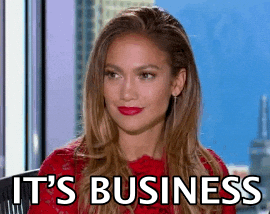 a woman in a red dress is sitting in a chair and says `` it 's business '' .