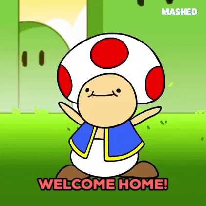 Cartoon gif. From the Mashed short "Yoshizilla": A goofy-looking interpretation of Toad from the Super Mario series exclaims: Text, "Welcome home!"