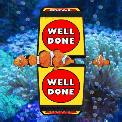 Digital art gif. We are underwater and clown fish swim around a cycling panel that says, "Well done."