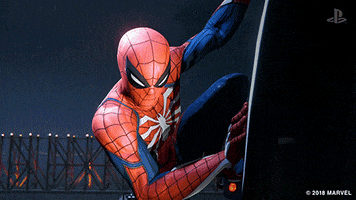 Video game gif. Zoom in on Spiderman in Spiderman PS4 as his spidey senses kick in. His eyes widen as symbols shoot from his head. A question mark and exclamation point shake next to his head. 