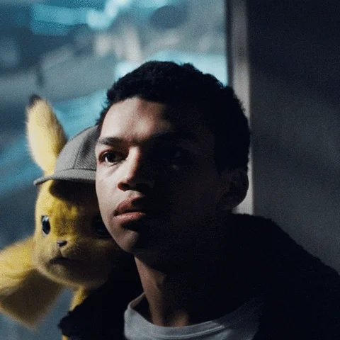  movie pokemon scared pikachu ryan reynolds GIF