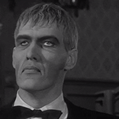 TV gif. Ted Cassidy as Lurch in The Addams Family rolls his eyes.