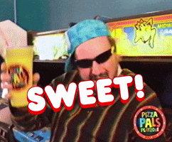 Video gif. A man in shades and 90s garb enthusiastically downs a soft drink in the now defunct Pizza Play Zone. Text, "Sweet!"